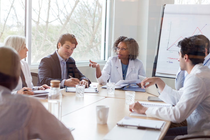 doctor in conference with colleagues 